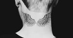 Justin Bieber's pair of angel wings tattooed onto the