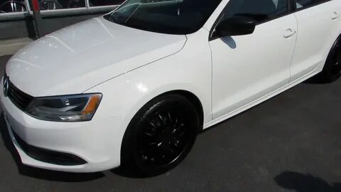 20013 VOLKSWAGEN JETTA WITH 18 INCH BLACK RIMS & TIRES - You