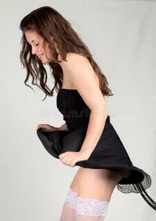 Playful Young Woman Blowing Up Her Hair Photos - Free & Roya