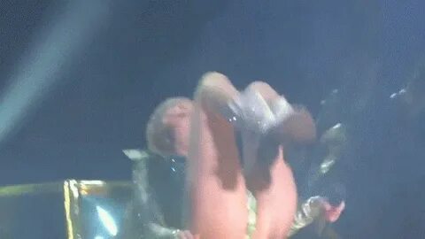 miley cyrus legs spread twerking car hood concert slut gif -
