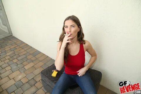 Attractive GF Molly Jane smokes and flashes her big natural 