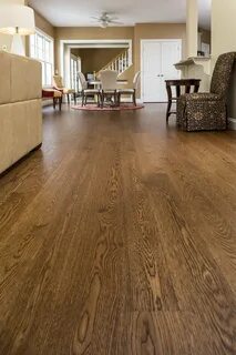 Wide plank white oak, finished with medium brown stain and h
