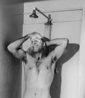 Burt Lancaster showering.