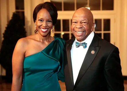 Download Elijah Cummings In A Tuxedo With His Wife Wallpaper Wallpapers.com