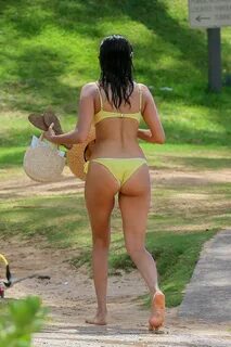 nina dobrev looks amazing in a yellow bikini as she hits the