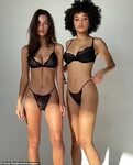 Emily Ratajkowski poses in lace lingerie with a fellow model