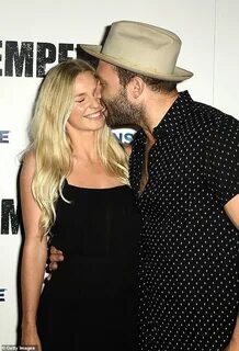 Jai Courtney gets playful with girlfriend Mecki Dent at Semp