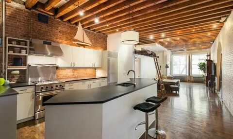 Full-Floor Flux House Loft with Endless Ceiling Beams Asks $