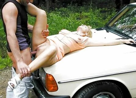 Sex on car bonnet