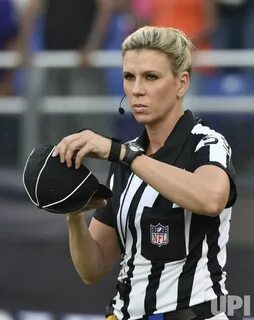 Photo: Female NFL referee Sarah Thomas prepares to officiate