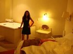My wife in our hotel room/Jr. Suite. Big bathtub. - Picture 