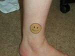 10 Scary and Silly Smiley Face Tattoo Designs Smiley face ta