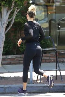 Ali Larter looks amazing in a sheer top and leggings shoppin