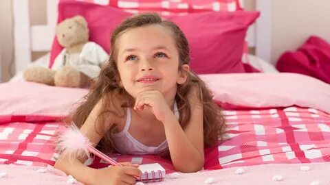 Beautiful Girl Baby With Pen And Small Note Is Lying On Bed HD Cute Wallpapers H