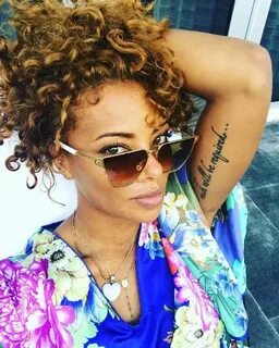 Eva Marcille's 19 Tattoos & Their Meanings - Body Art Guru