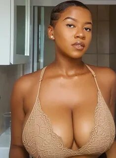 Small conical ebony boobs