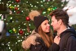 Loving couple in christmas market free image download