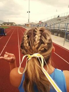 Braids...this would be cute for volleyball games and track m