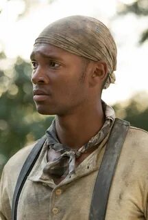 Sedale Threatt Jr. as Tom -- Roots Cast -- History.com Histo