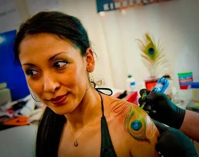 Tattoo Expo : getting a peacock feather design Peacock feath