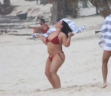 CHIQUIS RIVERA in a Red Bikini at a Beach in Tulum 01/22/202