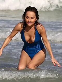 Giada De Laurentiis nipple slip in blue swimsuit at a beach 