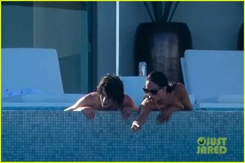 Timothee Chalamet & Eiza Gonzalez Get Steamy in the Pool Tog