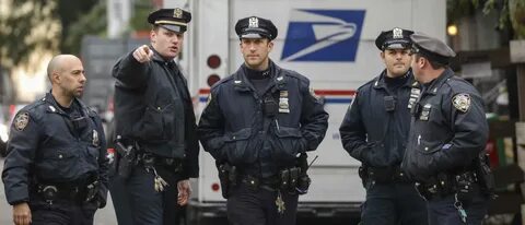 NYPD Cops Doused With Water, Struck In String Of Assaults - 