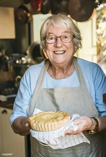 A grandmother carrying homemade fruit pie food photography r