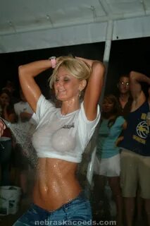 Wet tshirt contest of college girls leads into group sex.