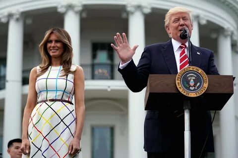 Melania Trump Stuns In Off-the-shoulder White Striped Dress At 'salute EC3