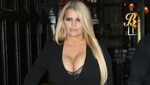 Jessica Simpson Sizzles in Sexy Snakeskin Swimsuit While In 