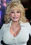 Dolly Parton flashes her tattooed tits - Ozzie News