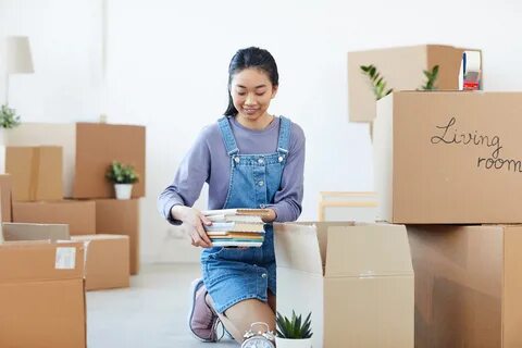 Asian girl in cardboard