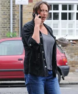 Miranda Hart shows off her new slimmed-down figure as she ru