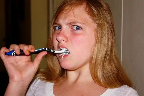 File:Annoyed Girl Brushing Teeth.jpg - Wikimedia Commons