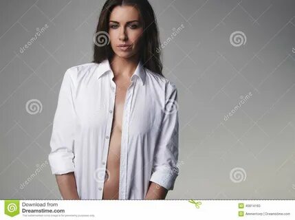 Natural Young Woman Wearing an Unbuttoned Shirt Stock Photo 