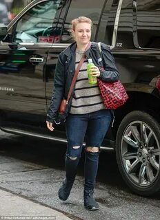 Makeup-free Lena Dunham steps out in a covered up casual ens
