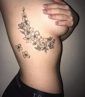 Side boob tattoo.