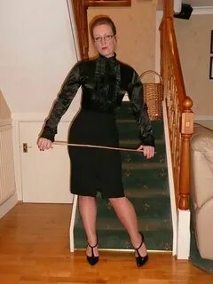 Mistress in her black satin blouse Old lady in satin blouse,