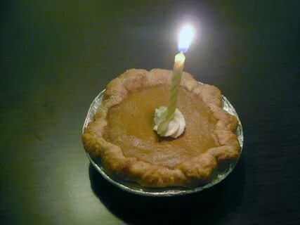 File:Pumpkin pie tartlet with candle and whipped cream.jpg -