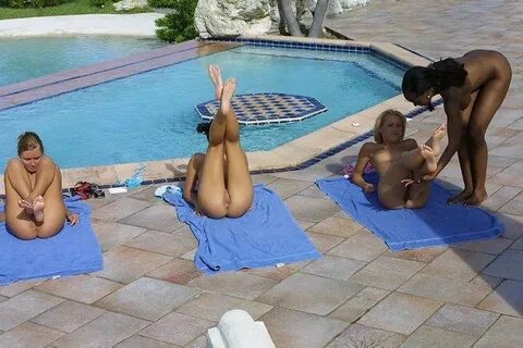 young girls outside at the pool doing physical exercises sea