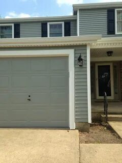 Garage door painted Valspar Gray Exposé 5007-2A at Lowes. Cl