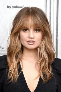 Debby Ryan Reveals How She Keeps Her Skin Looking Good While Traveling Meis...
