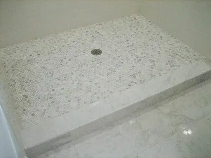 Hex or penny round for shower floor, marble tile curb. Showe