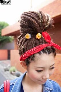 Japanese Girl’s Dreadlocks, Muay Thai Top & Chupa Chups Lollipops.