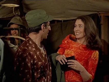 Jamie Farr and Bonnie Jones in M*A*S*H (1972) .