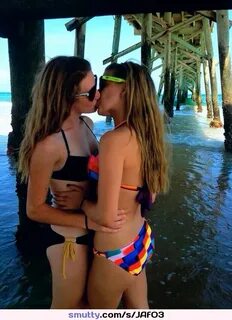 #lesbians #kissing #beach #bikini smutty.com