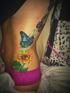 I am in love with my butterfly and sunflower tattoo butterfl