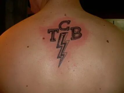 Elvis Presley's TCB tattoo